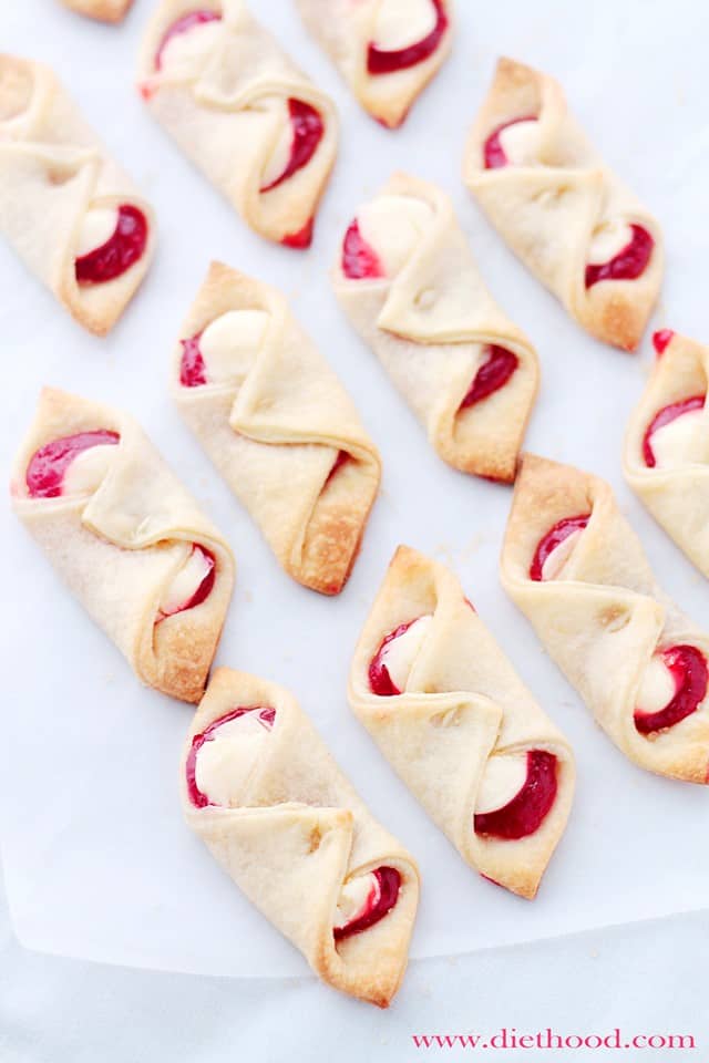 Strawberry Cream Cheese Pastries arranged on wax paper.
