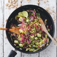 Shaved Brussels Sprouts Salad with Avocado and Pistachios | www.diethood.com | Hearty, healthy, and incredibly delicious sauteed salad packed with Shaved Brussels Sprouts, Red Onions, Avocado, Pistachios and a splash of lime juice. | #PistachioHealth #ad