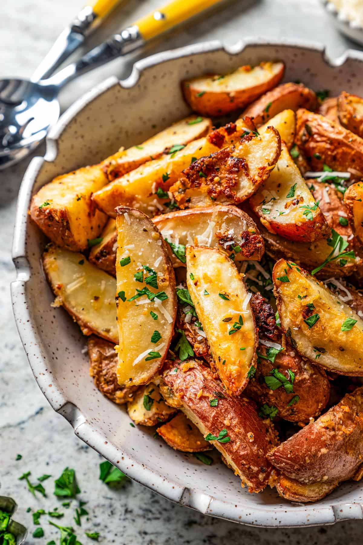 Bowl of garlic parmesan roasted potatoes.