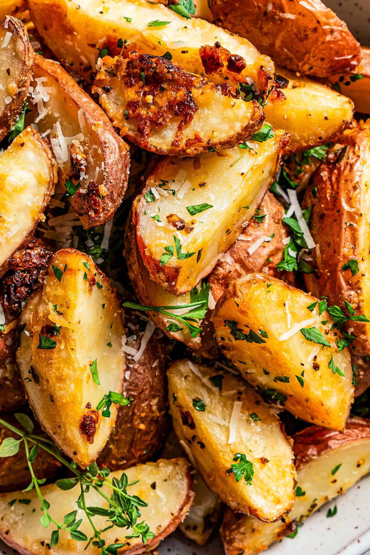 Upclose image of garlic parmesan roasted potatoes.