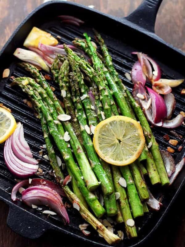 Pan Roasted Asparagus Almondine - Asparagus spears sauteed with almonds, red onions and lemon slices.