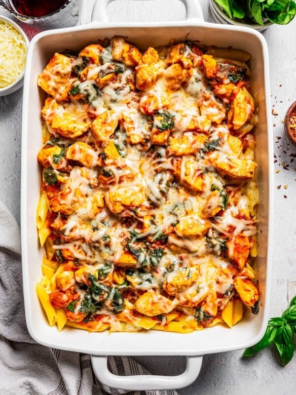 Overhead view of a chicken pasta bake in a casserole dish.