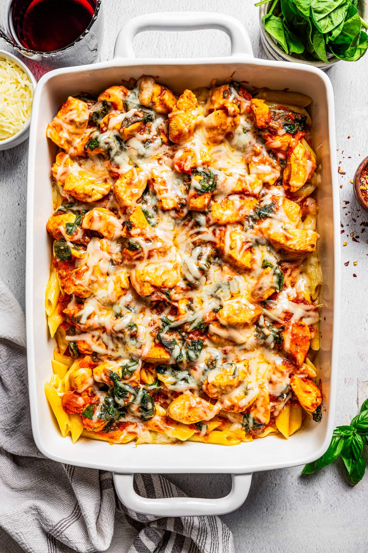 Overhead view of a chicken pasta bake in a casserole dish.