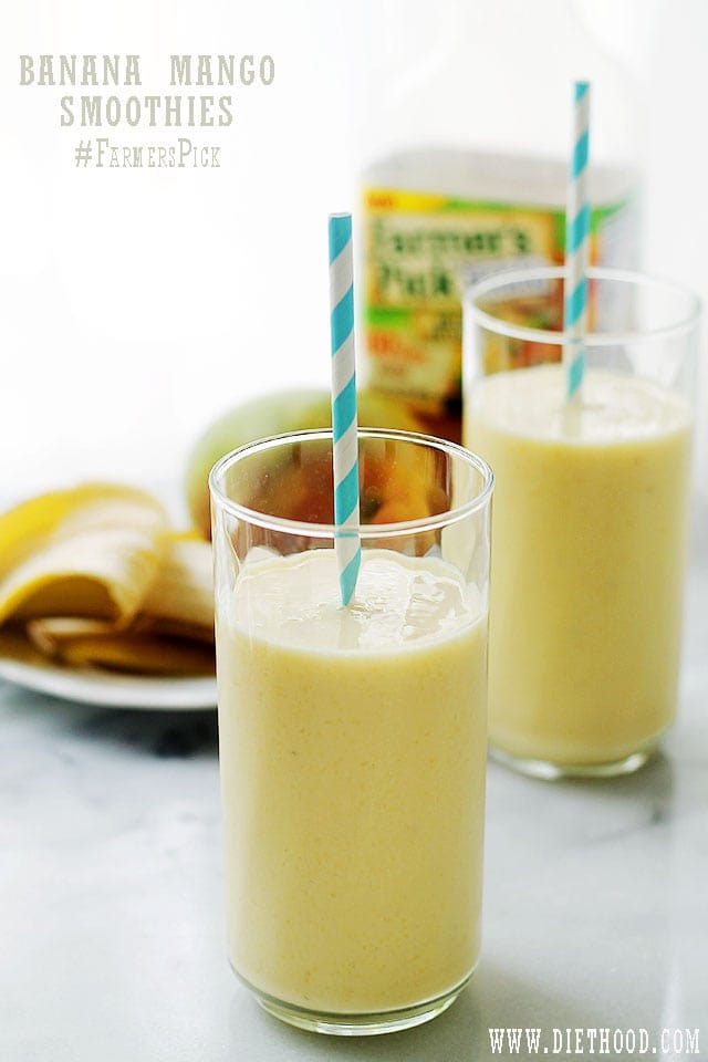 Two glasses of banana mango smoothies.