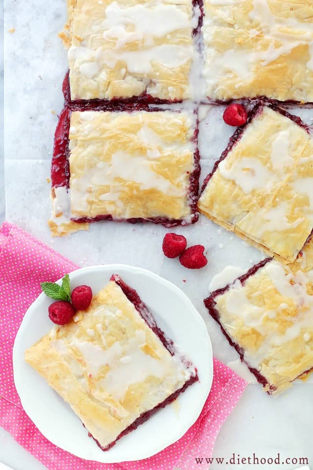 Phyllo Raspberry Pop Tarts with Vanilla Glaze | www.diethood.com | Layers of Phyllo Sheets filled with Raspberry Jam and topped with a sweet Vanilla Glaze. | #recipe #breakfast #dessert #raspberries