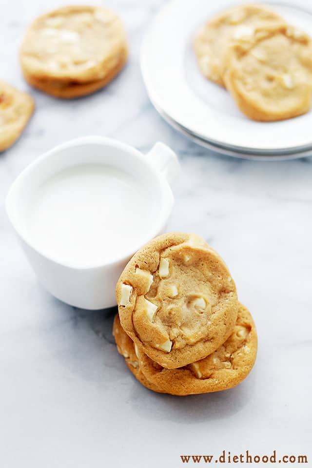 Overhead view of White Chocolate Chunk Cookies next to a glass of milk