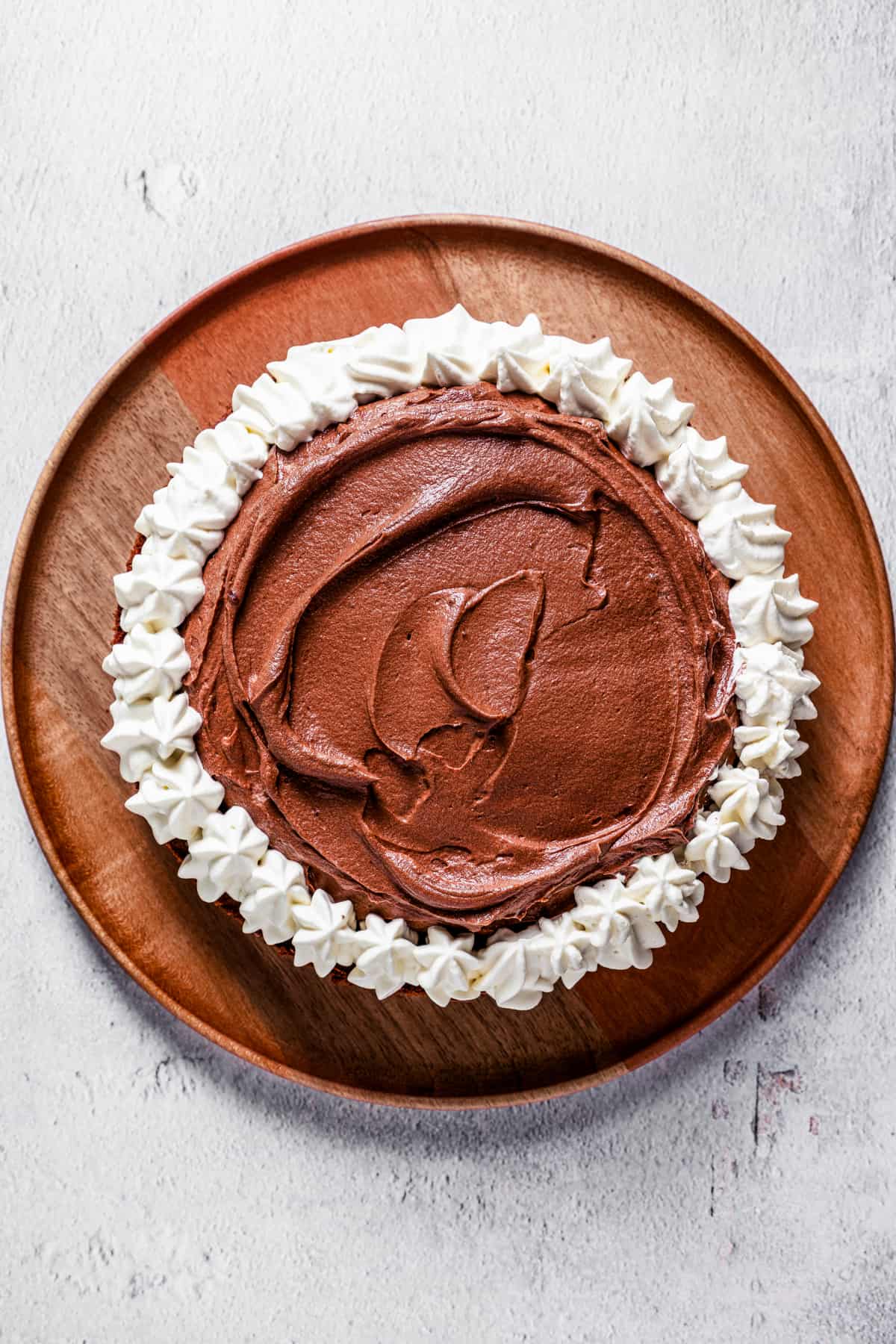 Overhead of chocolate mousse cake on a serving platter.