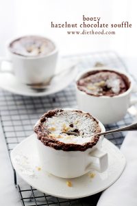 Boozy Hazelnut Chocolate Souffle in a white coffee mug.