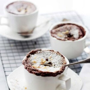 Boozy Hazelnut Chocolate Souffle in a white coffee mug.