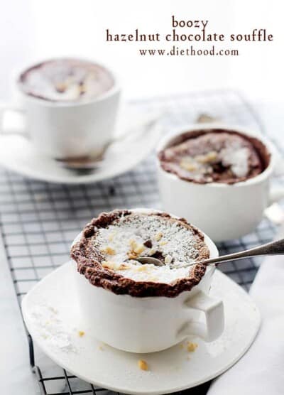 Boozy Hazelnut Chocolate Souffle - Made with delicious chocolate and hazelnut liqeuer, this elegant, French dessert may look like a lot of work, but you'll be surprised to see just how incredibly easy it is to make!