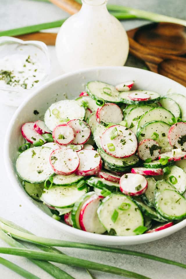 Radish and Cucumber Salad with Garlic-Yogurt Dressing: Deliciously crunchy slices of cucumbers and radishes tossed with a creamy and garlicky yogurt dressing.