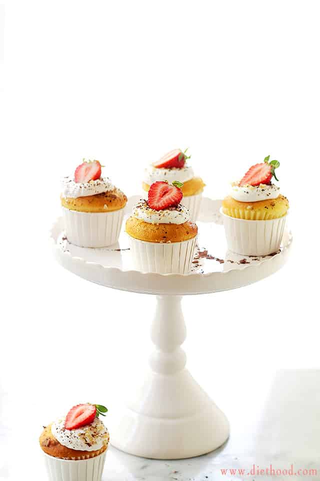Ice Cream Filled Vanilla Cupcakes | www.diethood.com | Sweet Vanilla Cupcakes are filled with Vanilla Ice Cream and topped with a Whipped Cream Frosting. | #recipe #cupcakes #icecream
