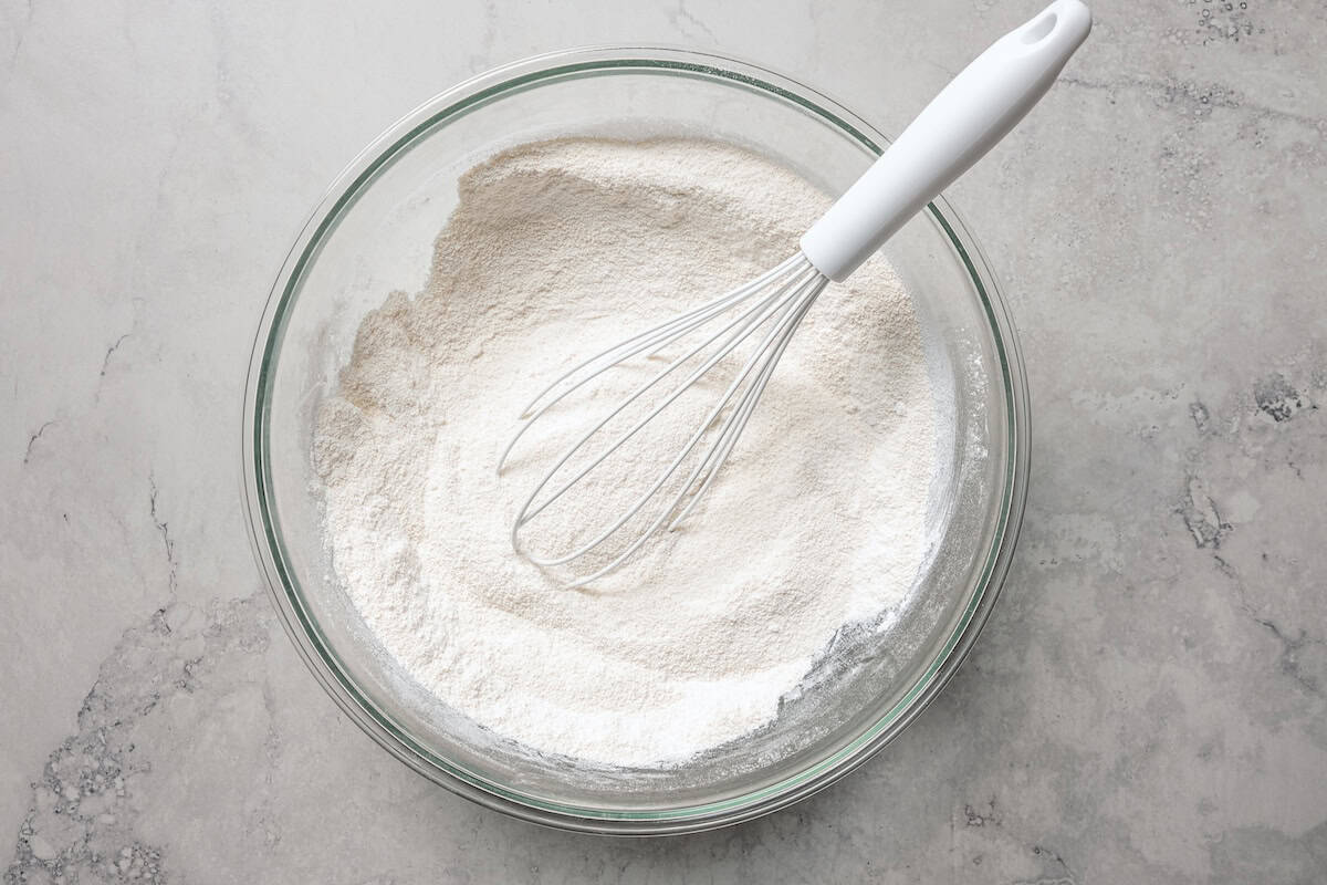 Dry ingredients whisked in a bowl.