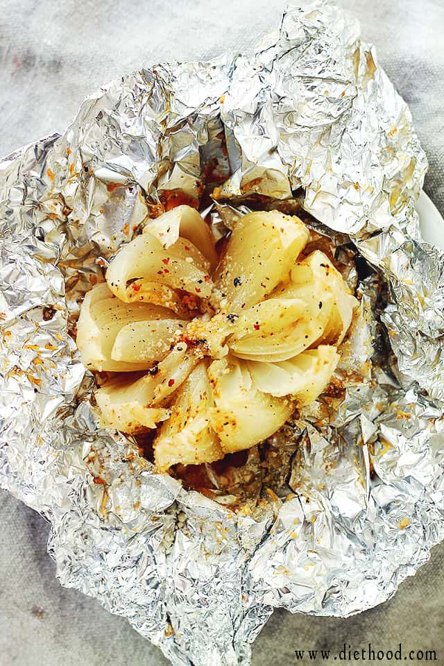 Overhead photo of a blooming Onion inside of foil.