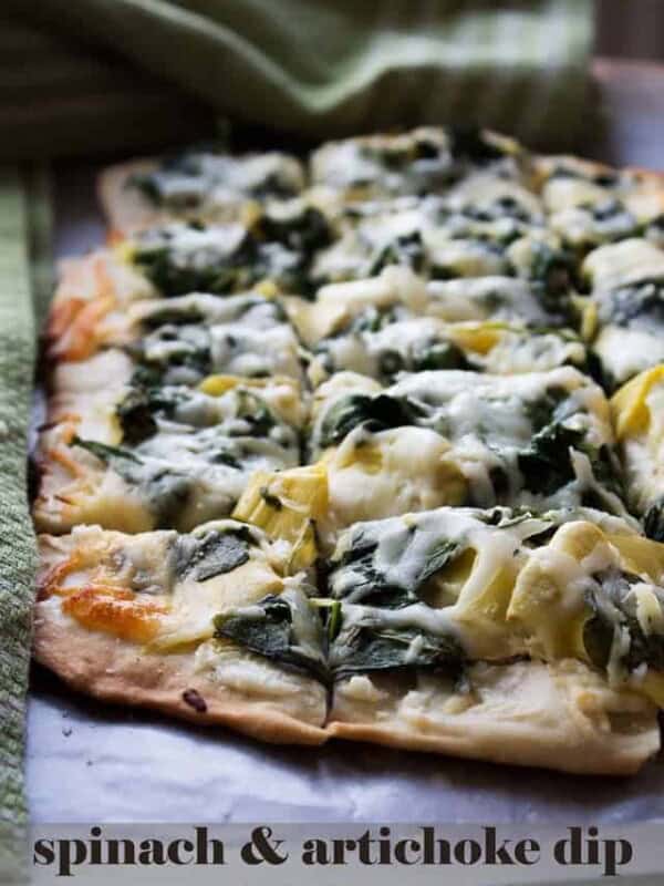 Spinach and Artichoke Dip Pizza - Homemade pizza crust topped with the best combination for dip including, cream cheese, spinach, and artichokes.