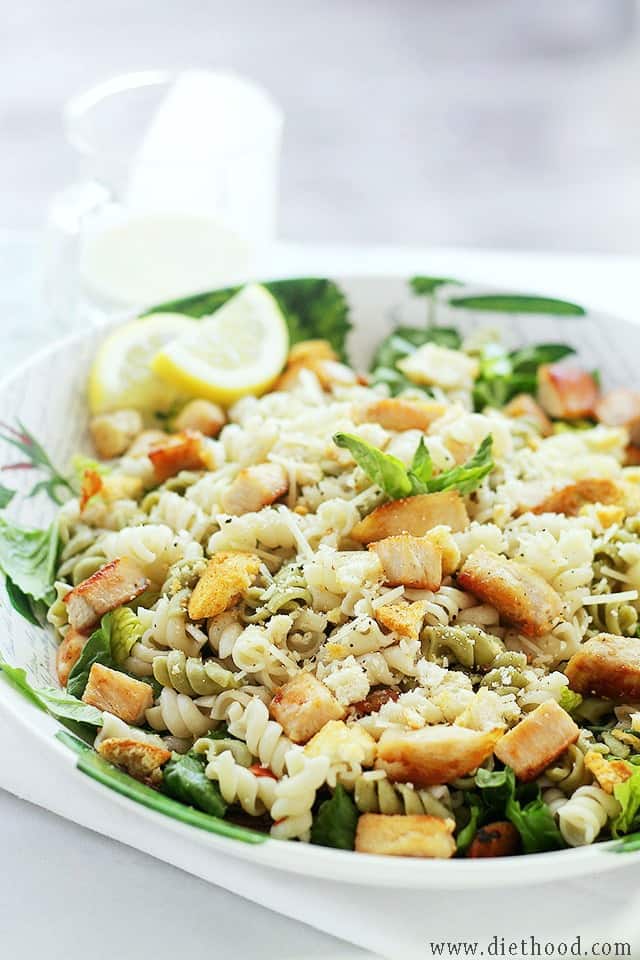 Chicken Caesar Pasta Salad with Light Caesar Dressing served in a large salad bowl.