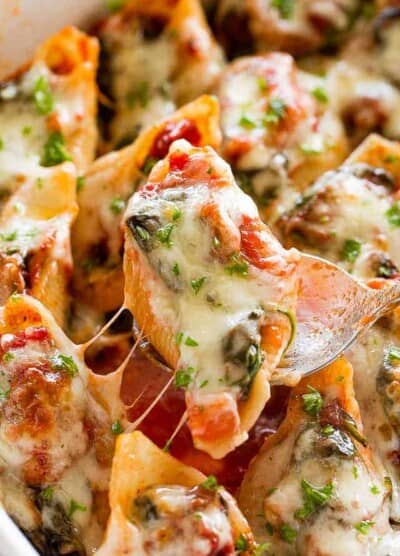 Pasta Shells stuffed with spinach, mushrooms, and tomatoes