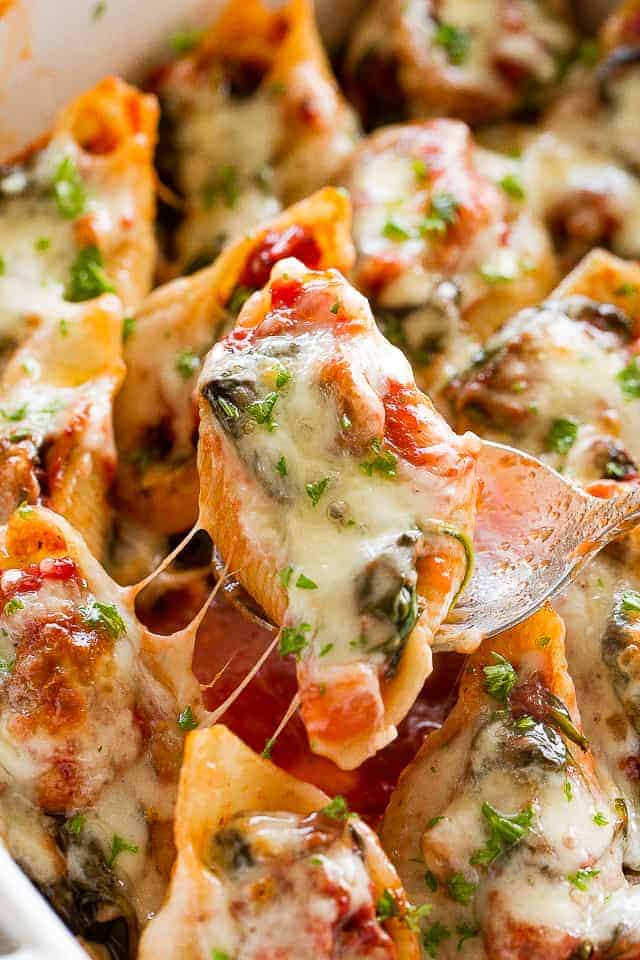 Pasta Shells stuffed with spinach, mushrooms, and tomatoes