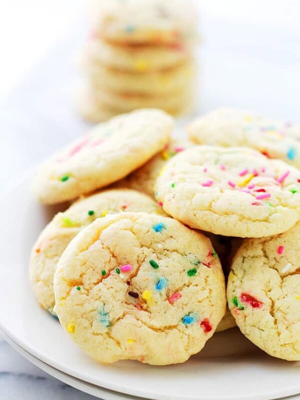 Cake Batter Funfetti Cookies arranged on a white plate.