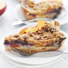Peach Blueberry Custard Pie with Streusel Topping | www.diethood.com | Pie crust filled with fresh peaches and blueberries tossed in a sweet and delicious custard, topped with a buttery streusel topping.