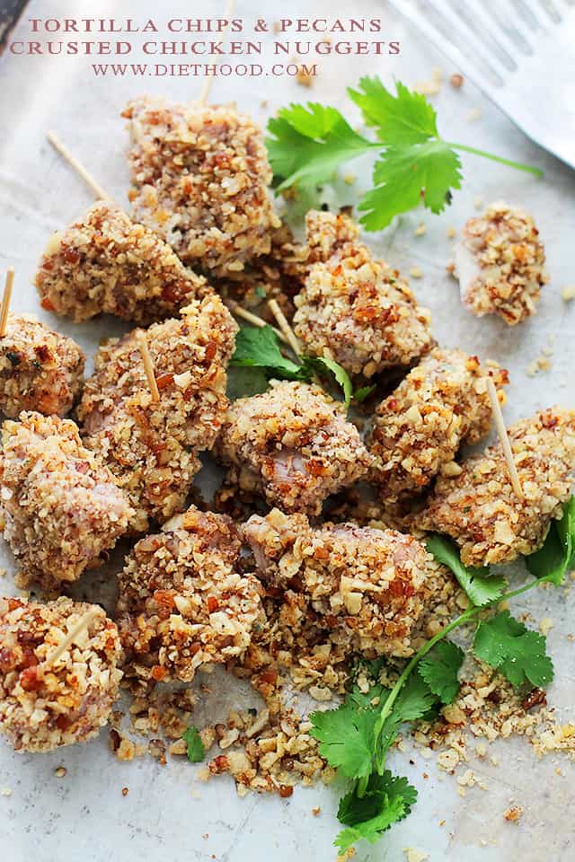 Tortilla Chips and Pecans-Crusted Chicken Nuggets | www.diethood.com | Baked, healthier chicken nuggets covered in a delicious and crunchy mixture made with tortilla chips and pecans. 