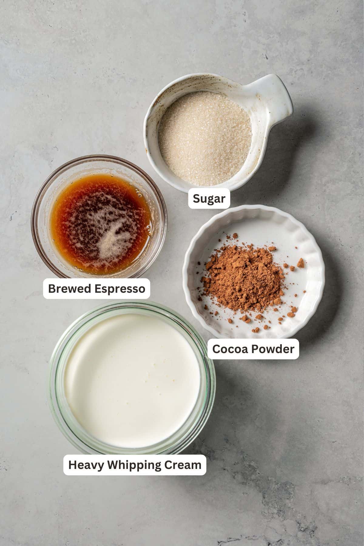 Espresso whipped cream ingredients with text labels overlaying each ingredient.