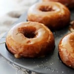 Baked salted caramel-glazed donuts in a pan