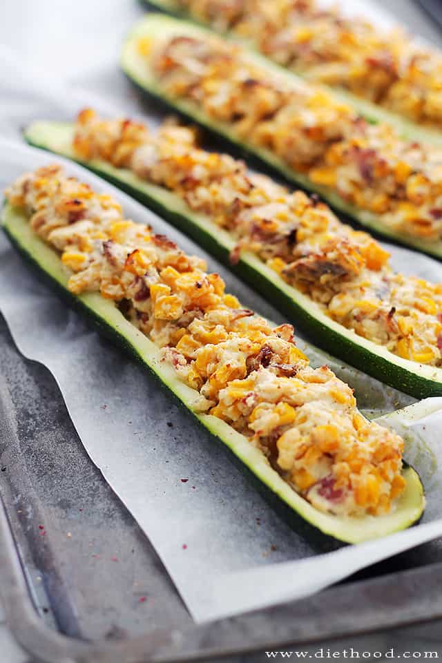 An image of Zucchini boats stuffed with corn, bacon, and cream cheese.