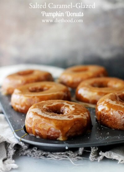 Baked Pumpkin Donuts glazed with salted caramel in a doughnut pan
