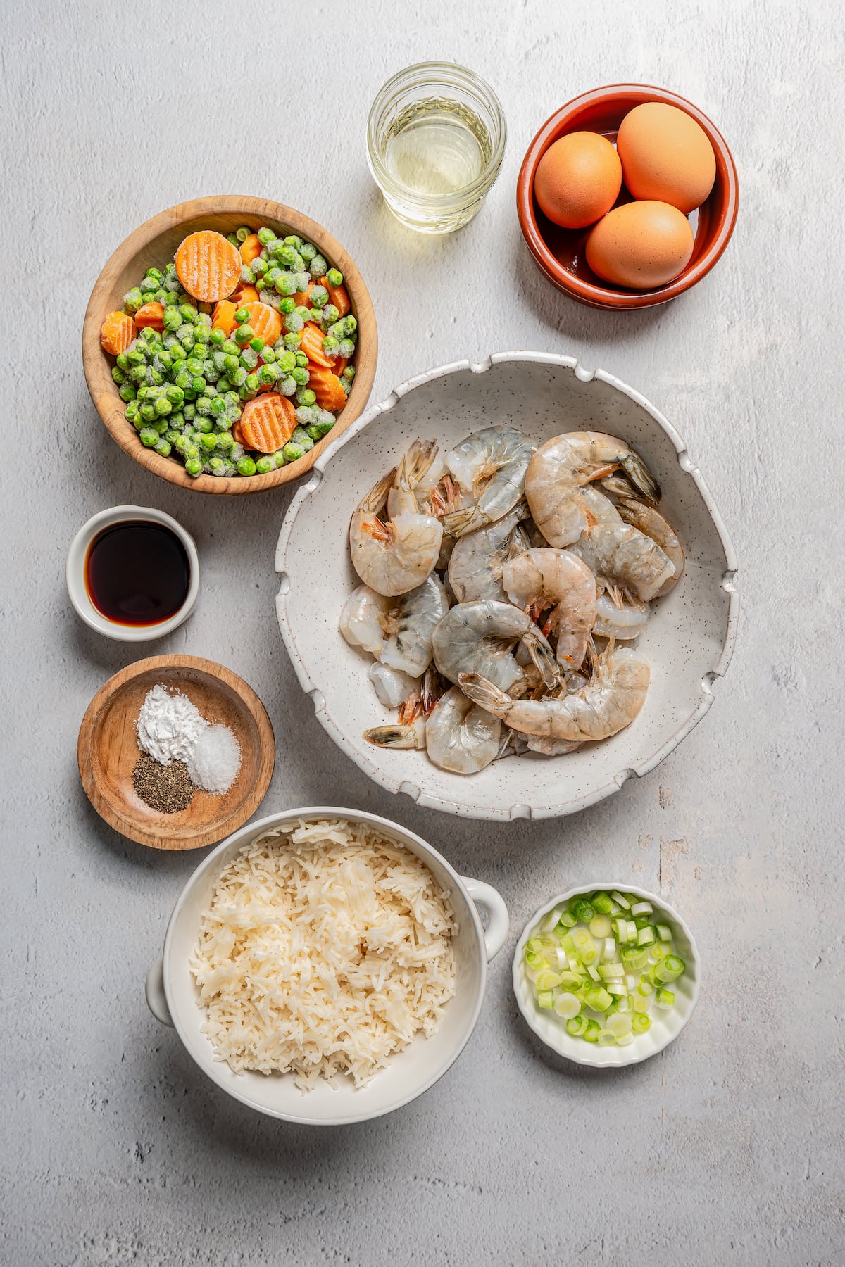 A photo of ingredients for shrimp fried rice.