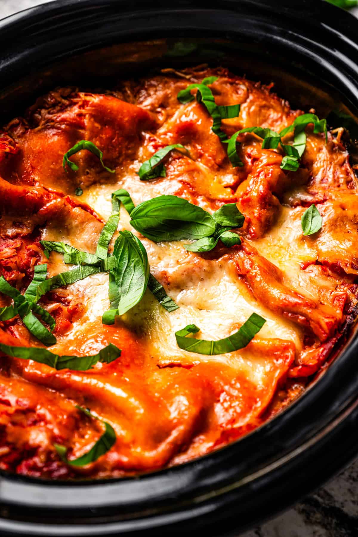 Close-up of crockpot lasagna inside the slow cooker.