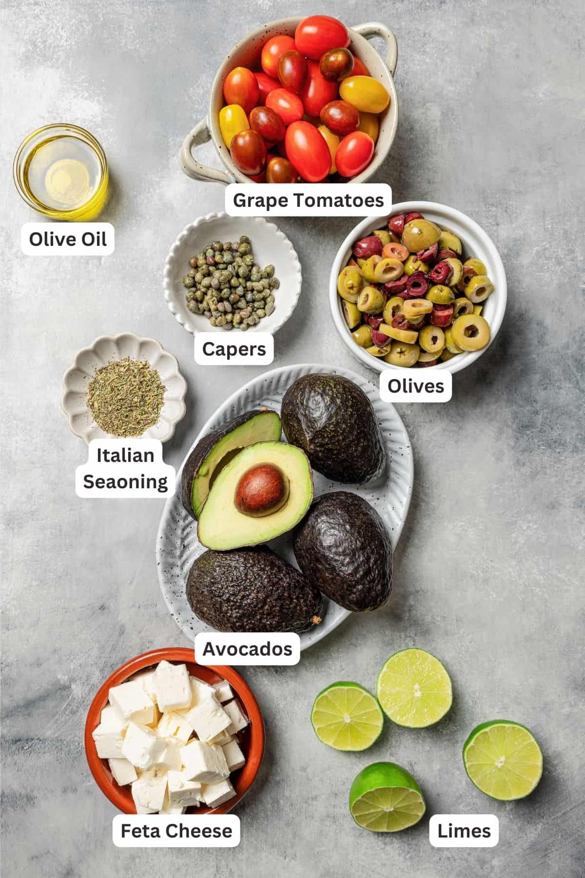 Ingredients for avocado salad with text labels overlaying each ingredient.