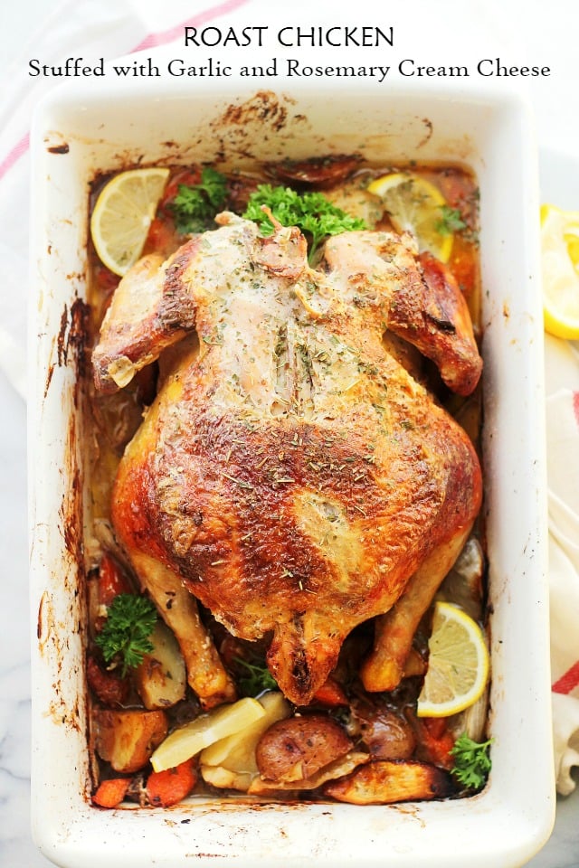 A whole roasted chicken in a baking dish.