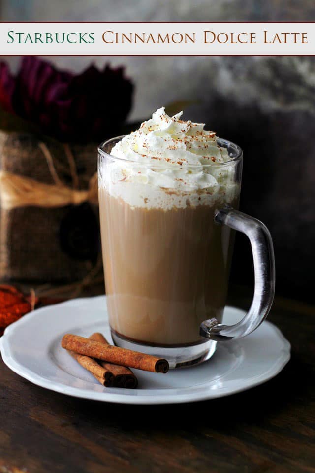 Starbucks Cinnamon Dolce Latte in a clear glass coffee mug.