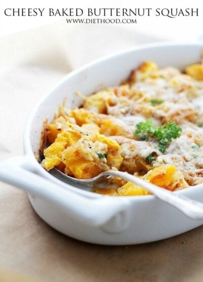 Cheesy baked butternut squash in a casserole dish.