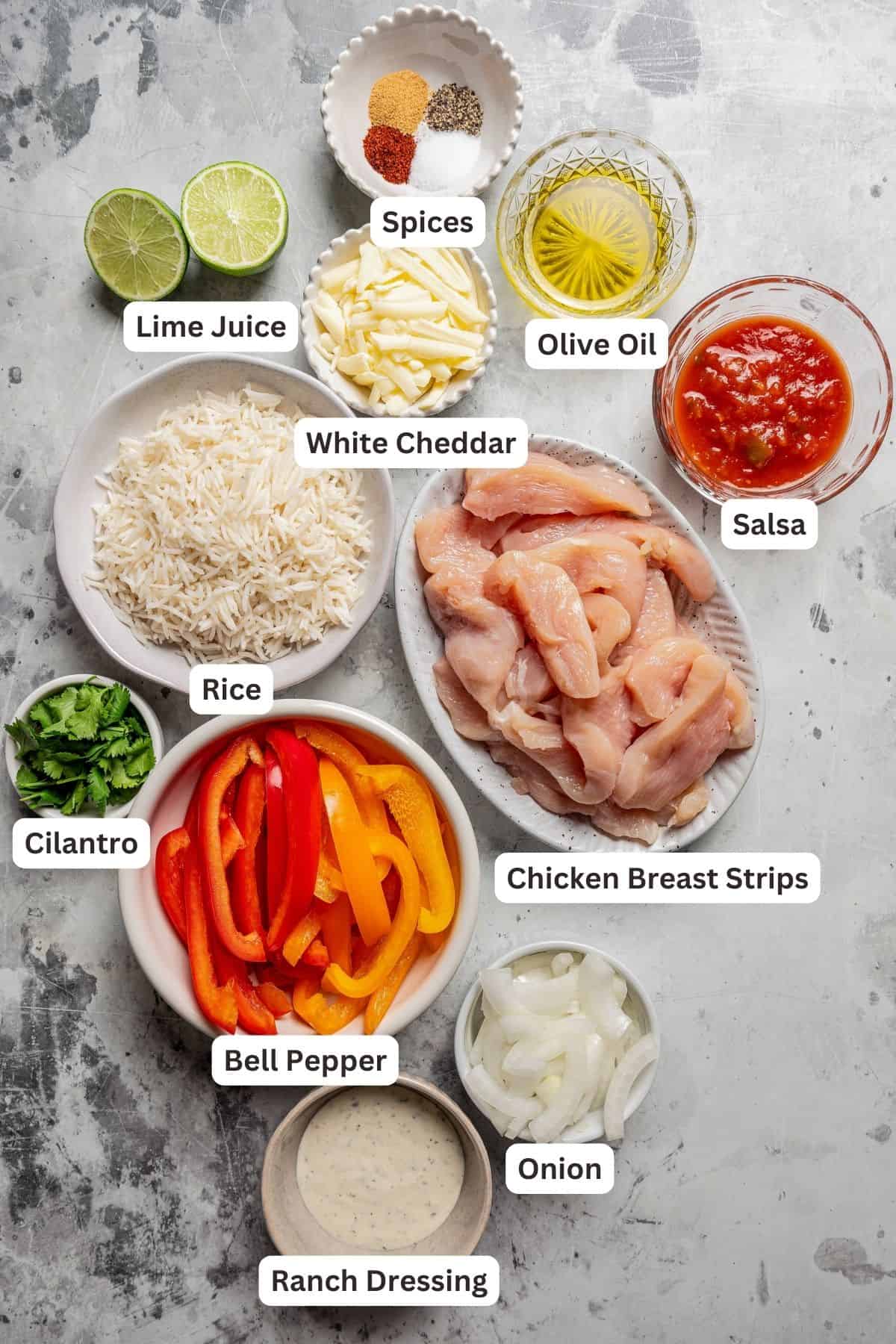 Ingredients for chicken fajita bowls with text labels overlaying each ingredient.