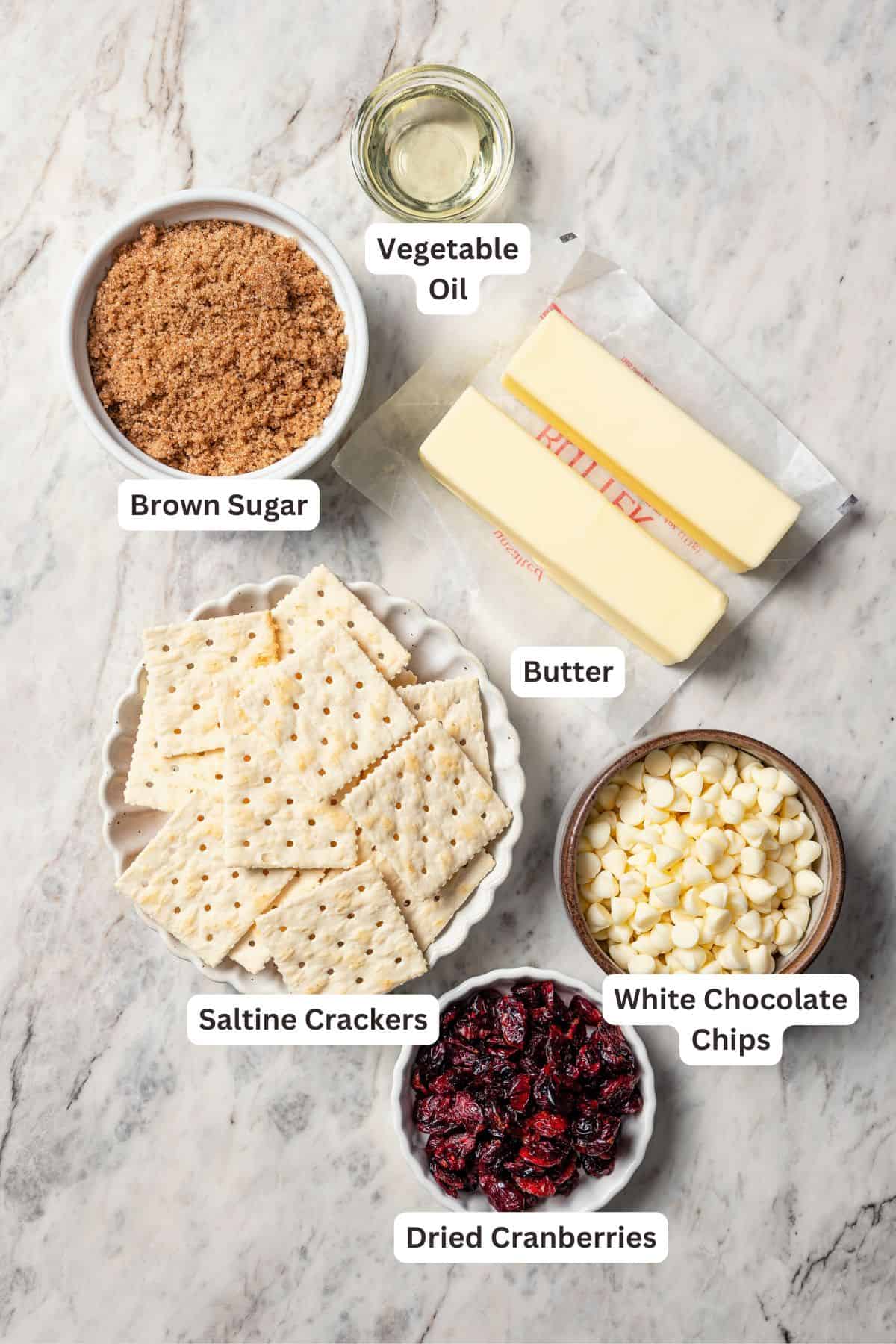 Christmas crack ingredients with text labels overlaying each ingredient.