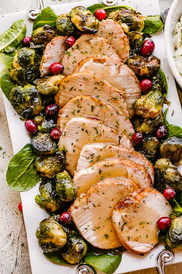 turkey breast slices with brussels sprouts.