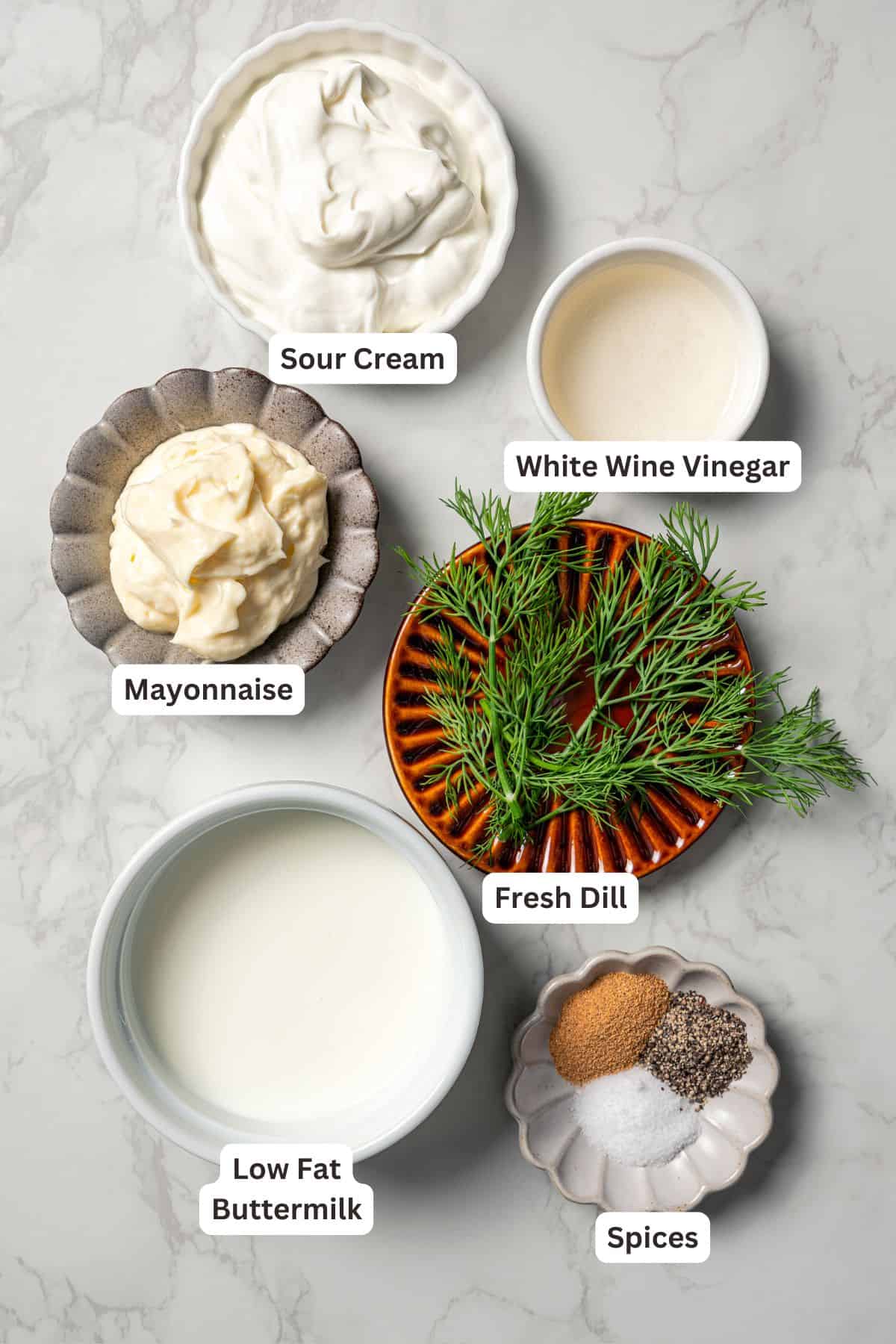 Ingredients for buttermilk ranch dressing with text labels overlaying each ingredient.