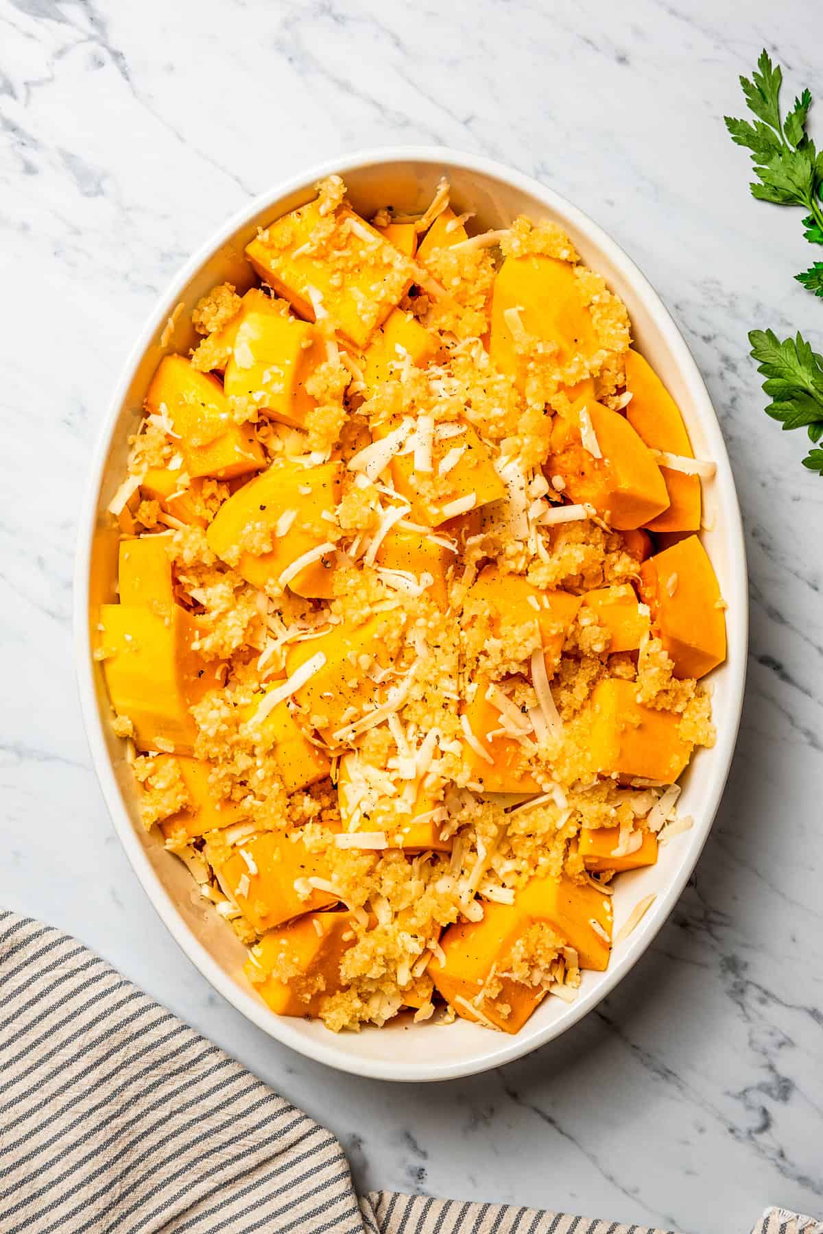 Cubed squash in a baking dish.