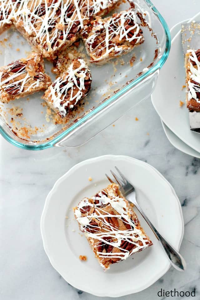 Caramel Pecan Pie Bars | www.diethood.com | Buttery crust topped with a decadent caramel mixture, a layer of pecans and a white chocolate drizzle.