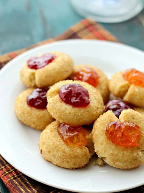 Thumbprint cookies with jam in the center.