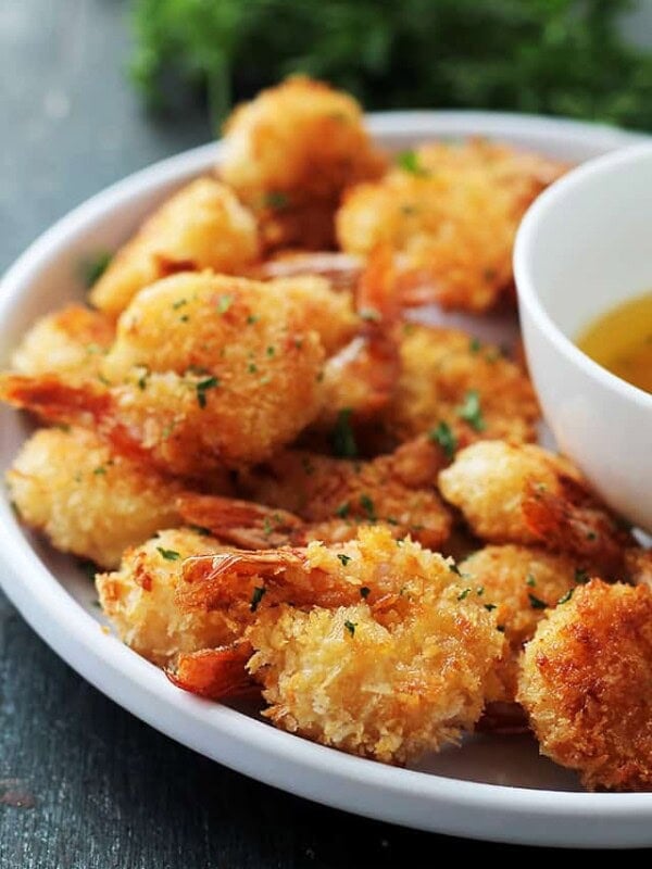Breaded shrimp on a plate.