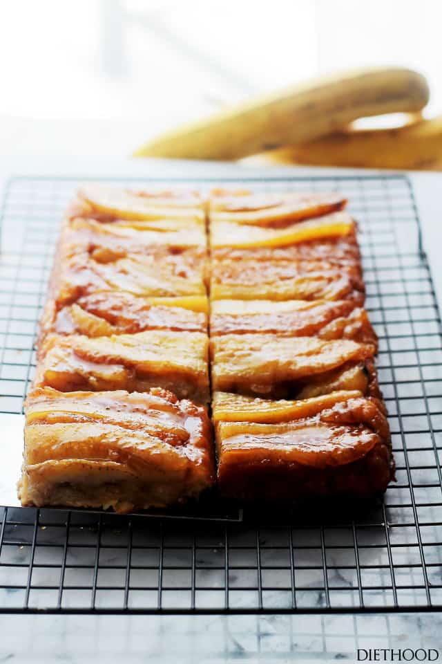 Banana upside down cake on a cooling wrack.