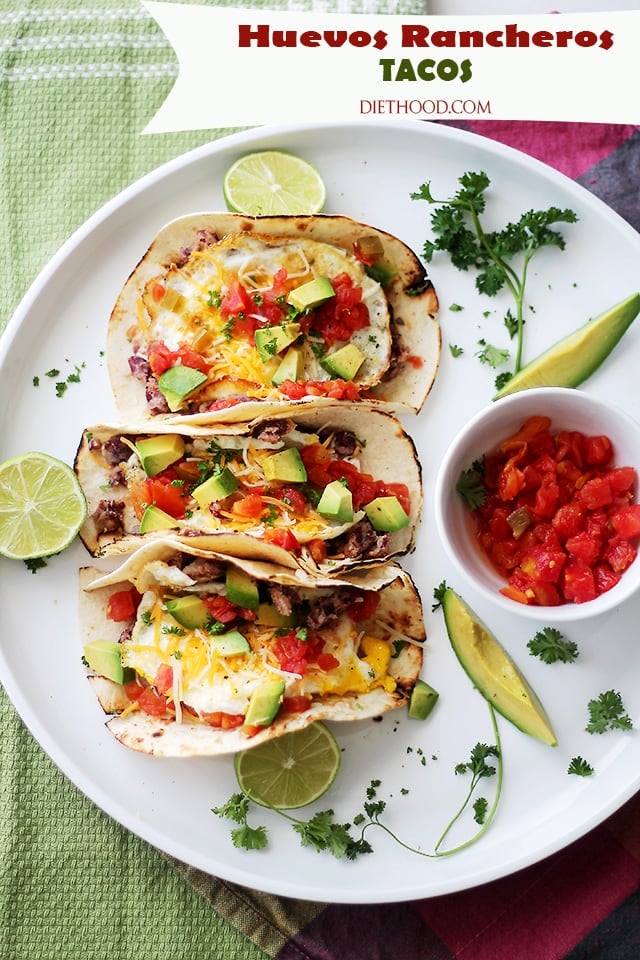 Huevos Rancheros Tacos | www.diethood.com | Soft tortillas stuffed with homemade refried beans, eggs, green chilies, tomatoes, cheese and diced avocados. Simple, but incredibly delicious! 