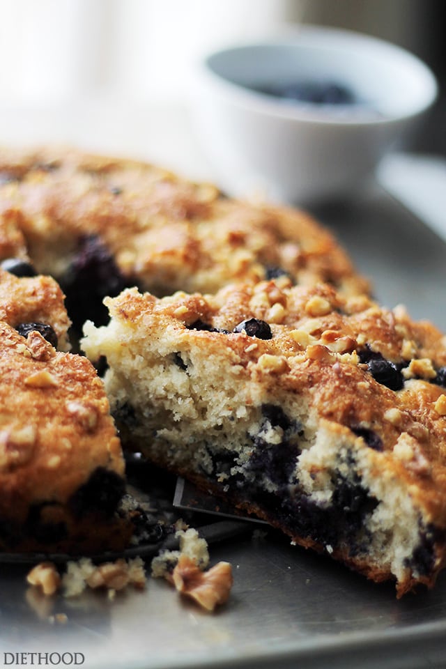 Cutting out a piece of a Blueberry Coffee Cake
