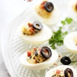Labeled image of bacon deviled eggs on a serving platter.