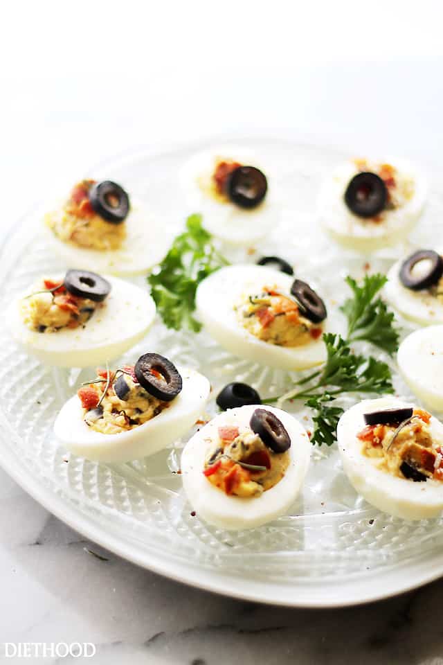 Bacon deviled eggs on a serving platter.