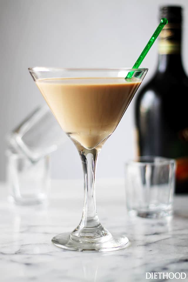 Irish Martini served in a martini glass with a green mixing pick