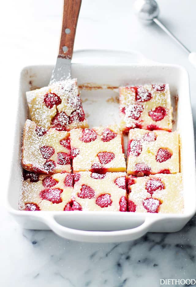 Raspberry Lemon Bars | www.diethood.com | Bursting with flavor and texture, these Lemon Bars are not only delicious, but at 150 calories per serving, they're also much lighter than your classic Lemon Bars.